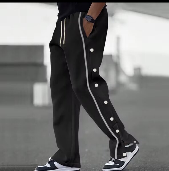 Pantalon de sport à boutons latéraux