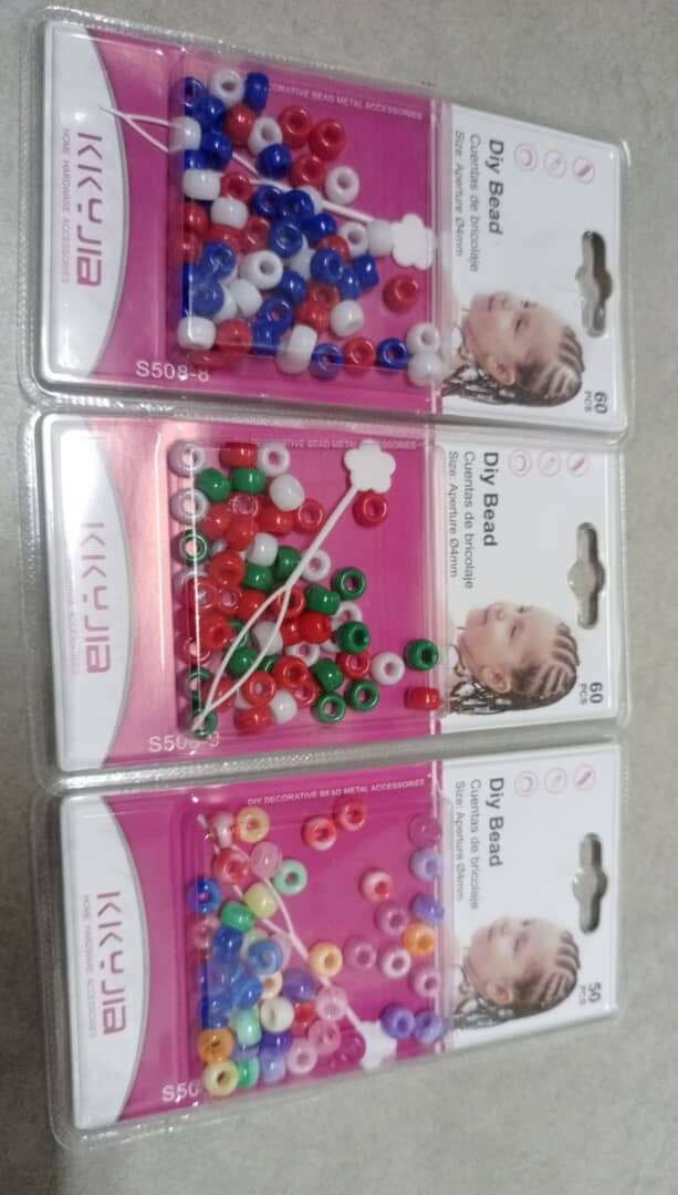 Perles colorées pour cheveux