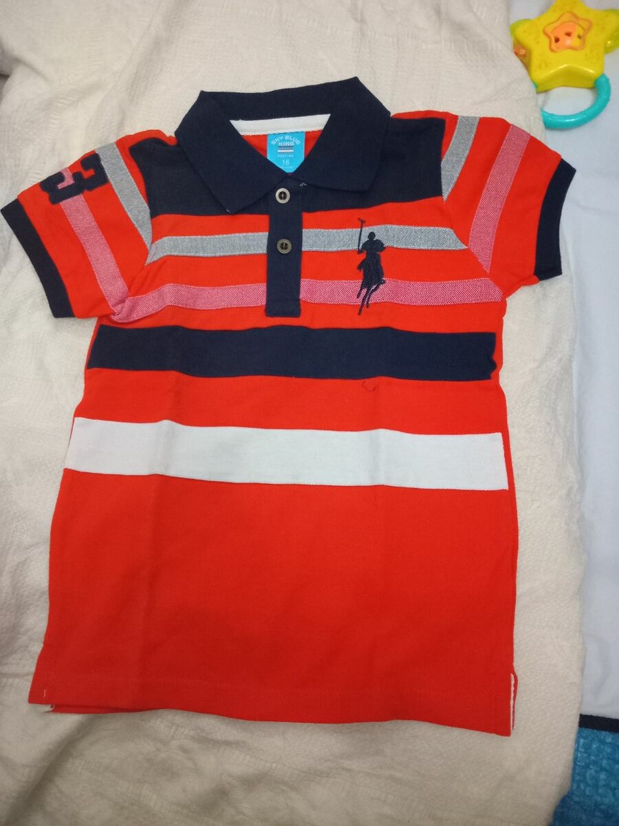 Polo rayé garçon rouge