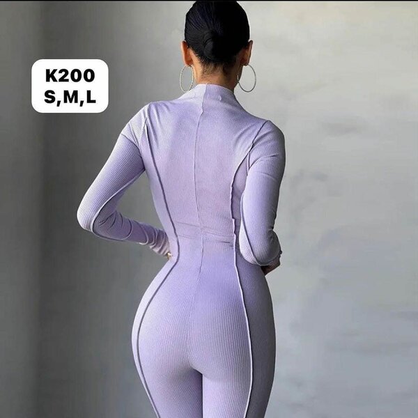 Women's lilac jumpsuit with long sleeves