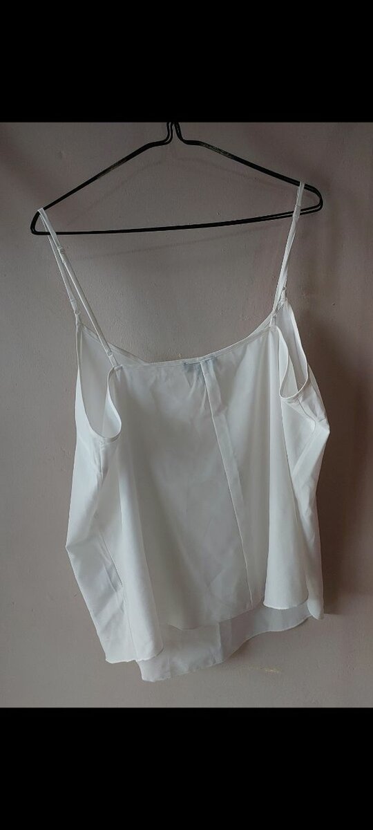 White Sleeveless Blouse