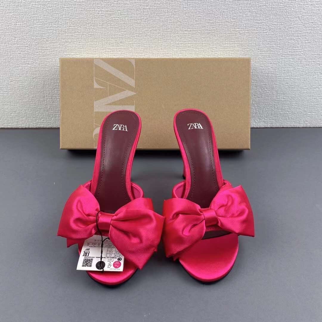Bow tie slipper heel