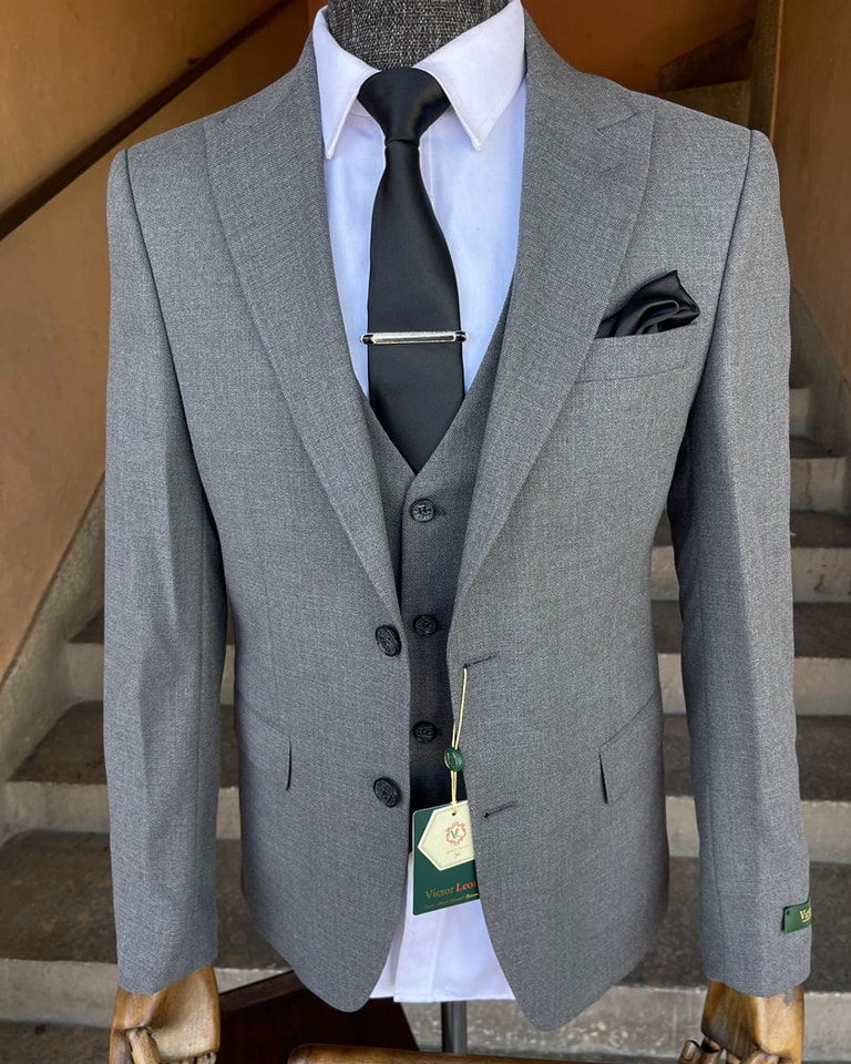 Charcoal grey suit.