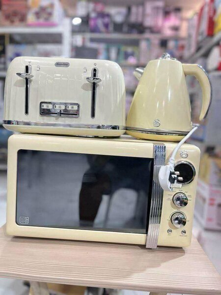 Pop up toaster with microwave and kettle