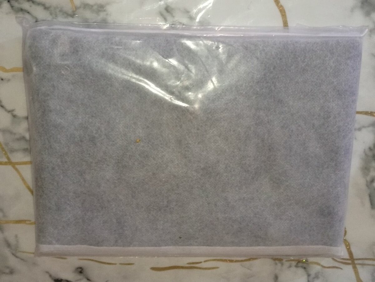 Pochette en cuir tressé