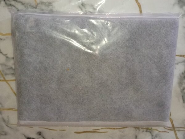 Pochette en cuir tressé