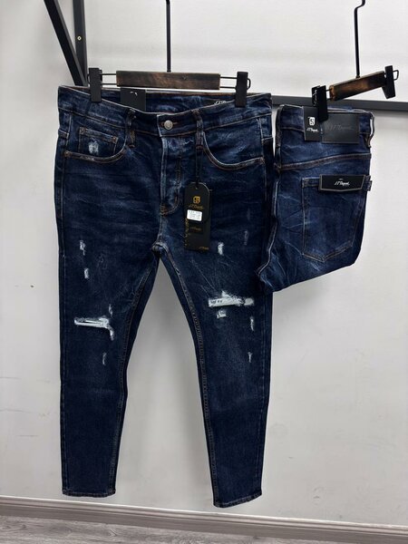 Jeans homme déchirés tendance