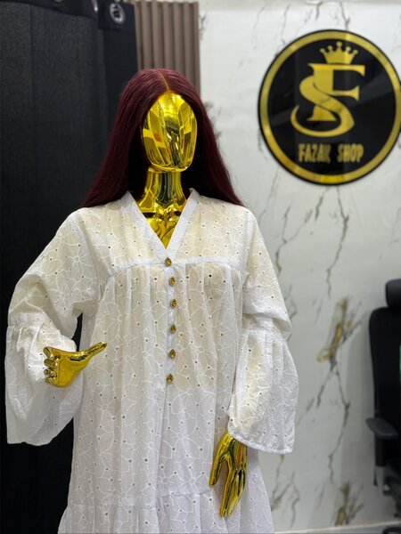 Robe blanche en dentelle bohème