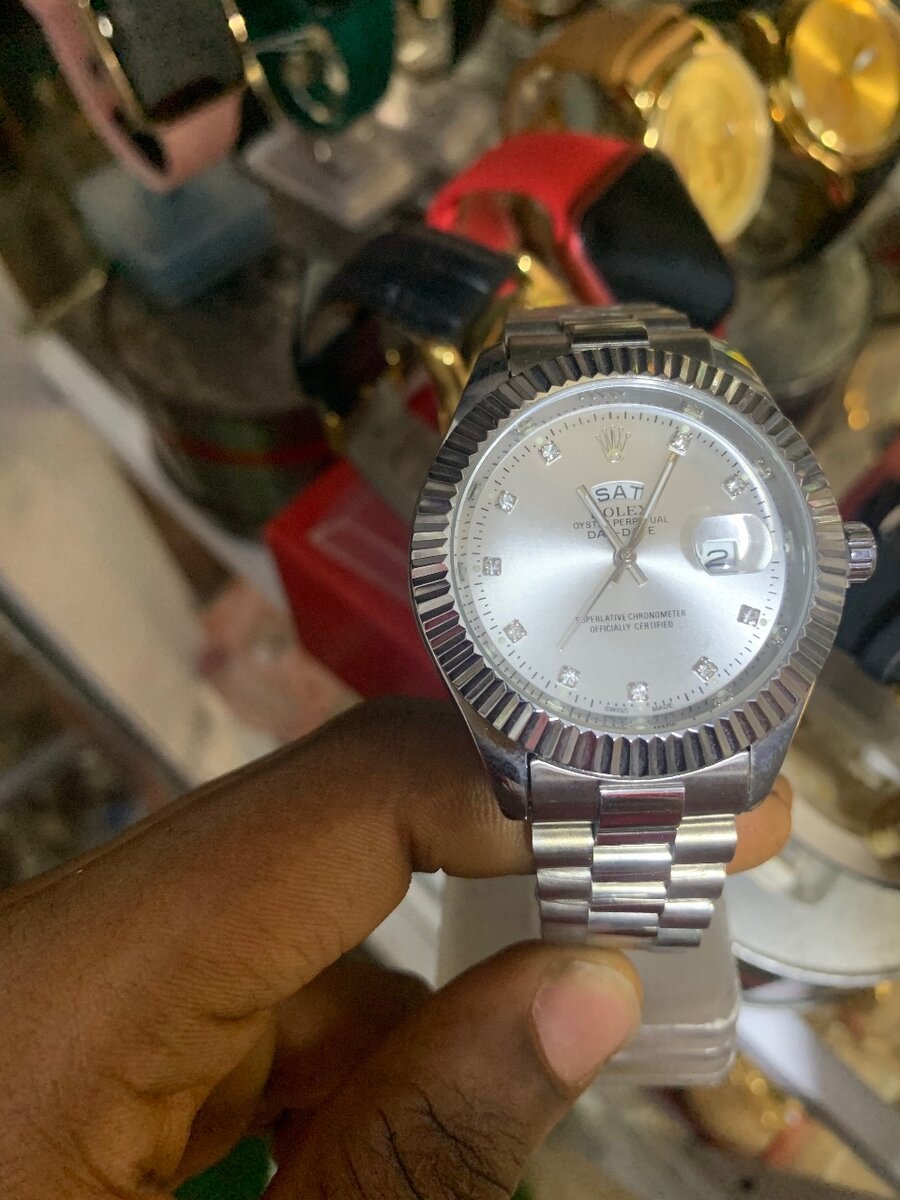 Silver Rolex wrist watch