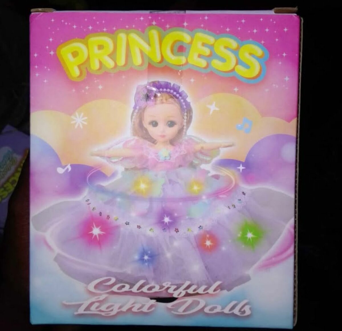 Poupée lumineuse musicale