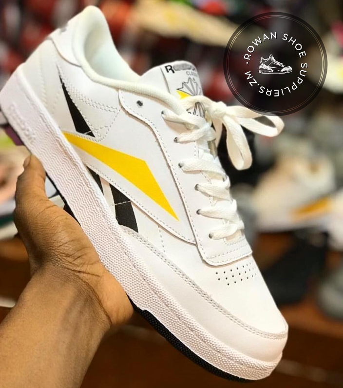 REEBOK SNEAKERS  -Sizes:6-9 white with yellow