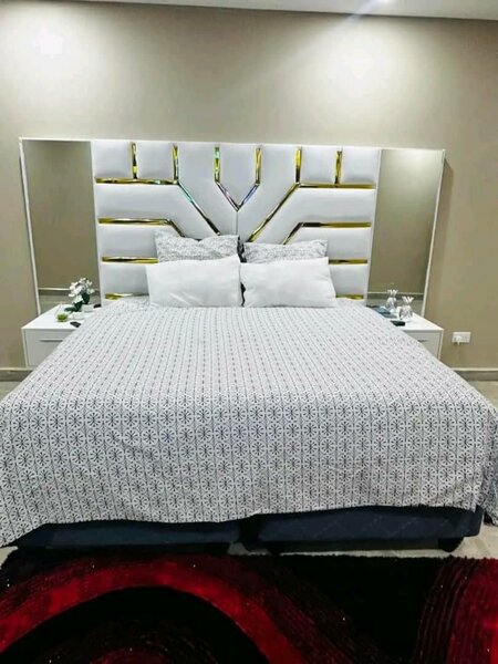 Stylish and high-quality double bed with headboard