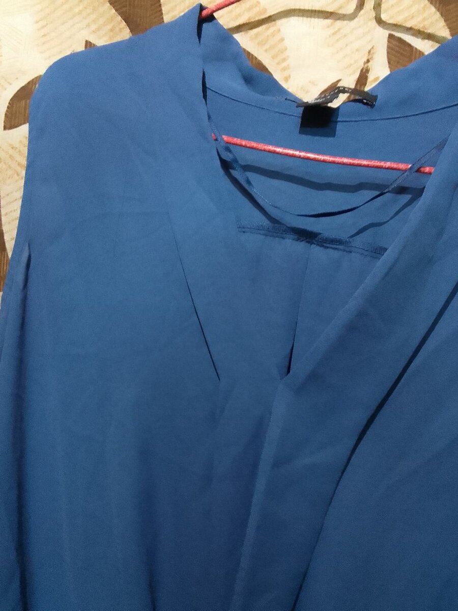 Blouse élégante sans manches