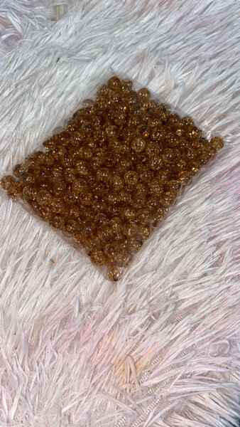 Perles dorées scintillantes