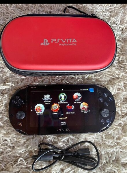 Console de jeu PSVITA avec étui rouge