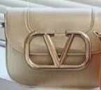 Beautiful fashionable women's handbag color golden