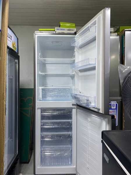 Réfrigérateur congélateur inox 268L