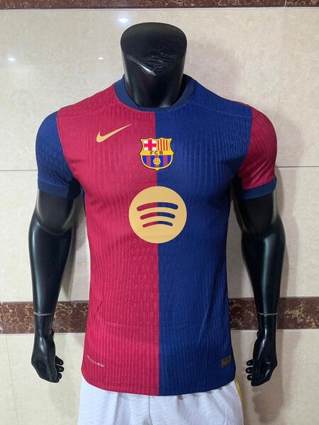 FC Barcelona men's soccer uniform in blue and garnet with Nike and Spotify logos