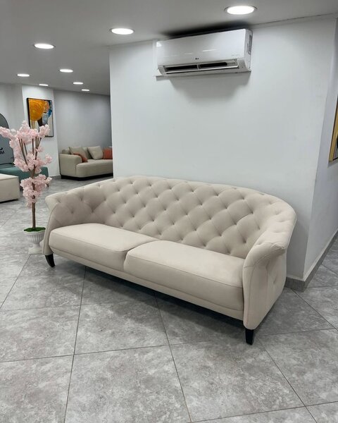 Canapé élégant en velours crème