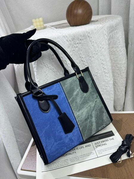Sac à main élégant bicolore