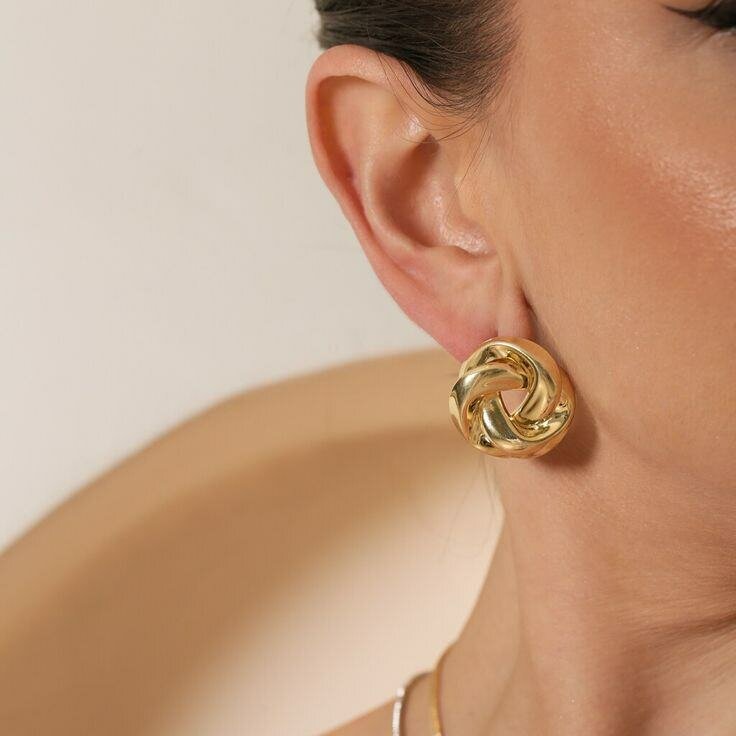 Boucles d'oreilles torsadées dorées
