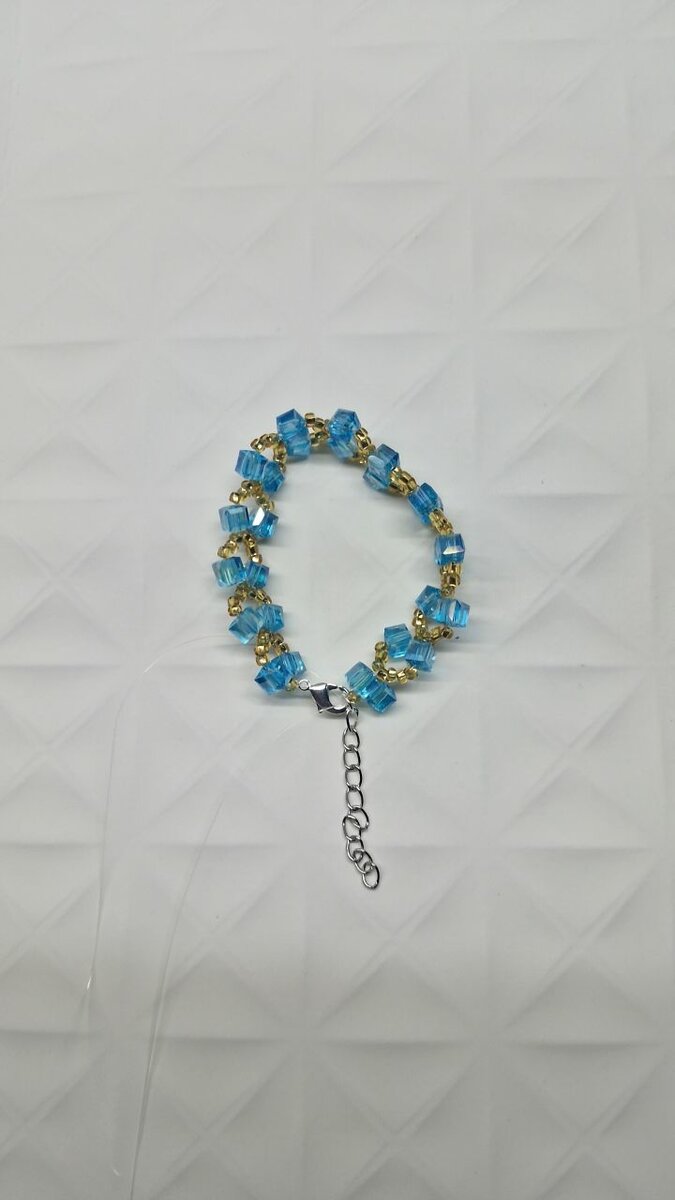 Bracelet perles bleues dorées