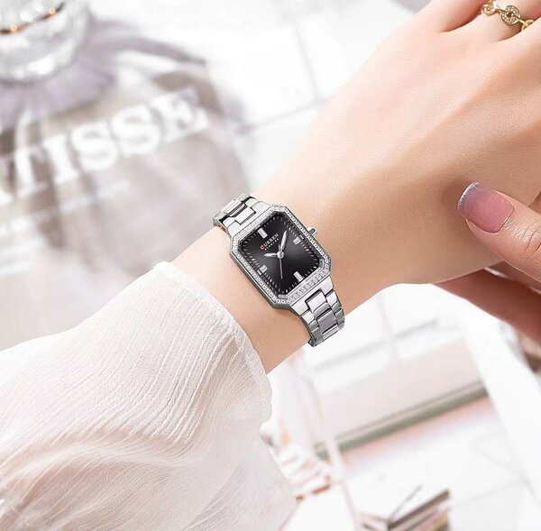 Montre élégante bicolore