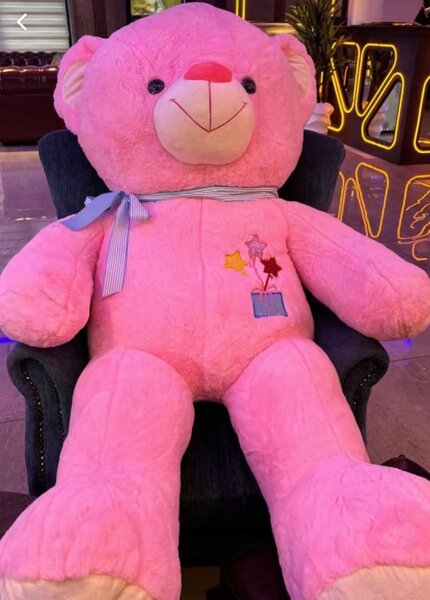 Grand ours en peluche rose
