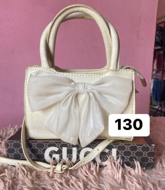 Women's bag white with a beautiful bow
