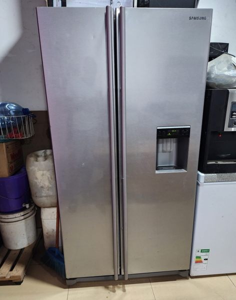 Gray double door upright fridge with a Dispenser