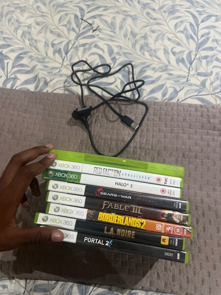 Xbox 360 Slim ( With games, and extra Accessories )