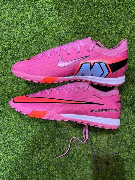 Chaussures de course Nike roses