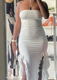 Asymmetrical dress, deep cutouts on the sides at the hem, white