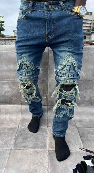 Jean déchiré tendance homme