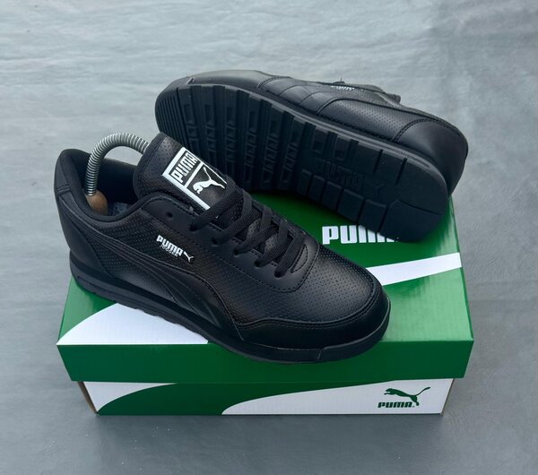 Chaussures Puma noires élégantes