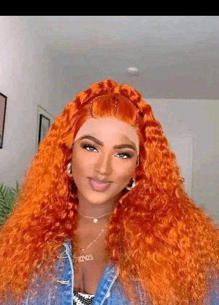 Perruque longue ondulée orange