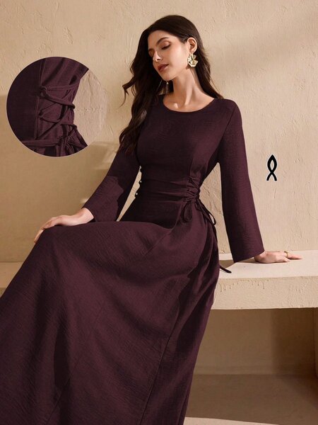 Robe élégante longue ceinturée