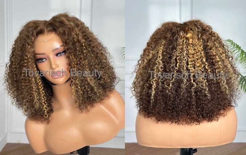 Charlotte - Curly with buttercream highlights.