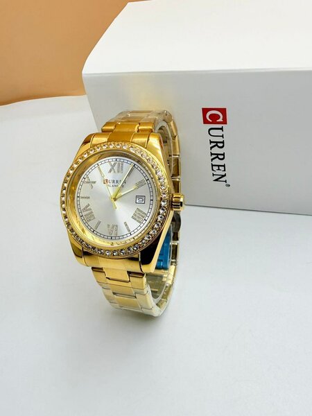 Montre dorée CURREN