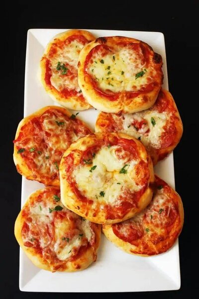 Mini pizzas gourmandes4 à1000f