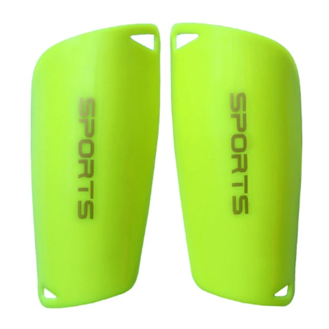 Protège-tibias de football verts