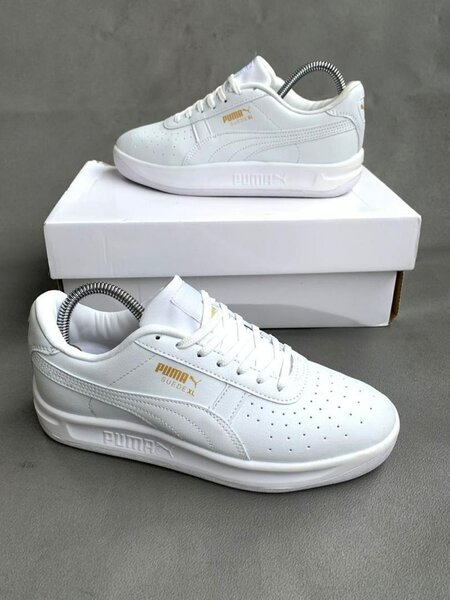 Sneakers blancs en cuir pour homme