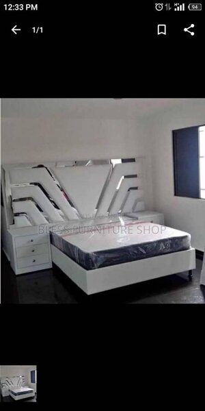 White leather accent Queen size bed frame with side drawer