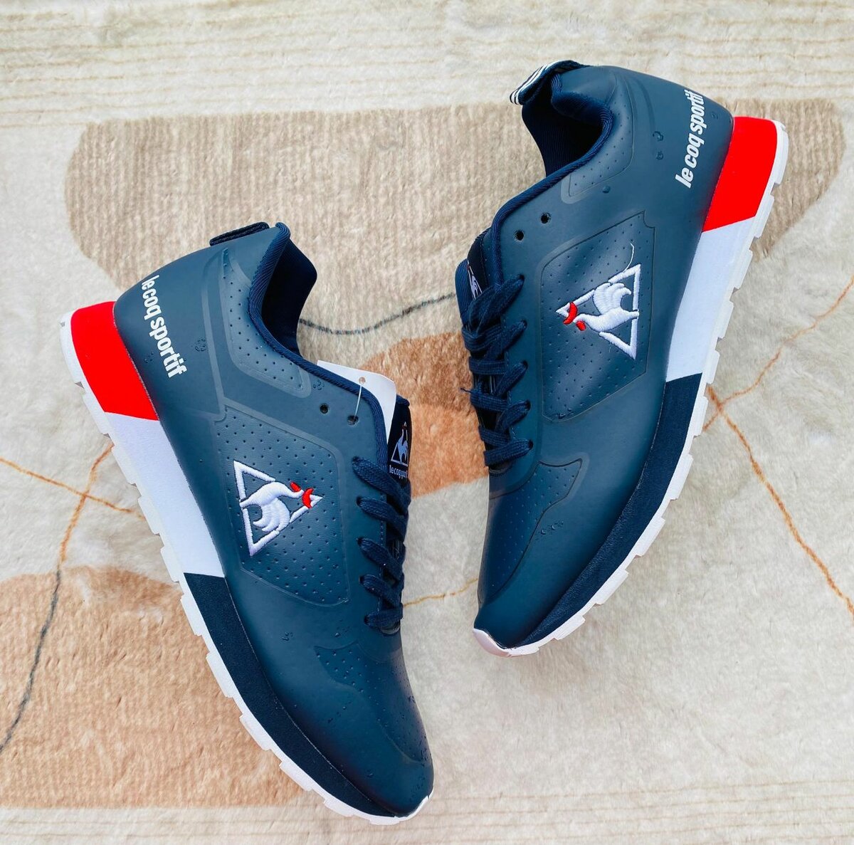 Ie coq sportif