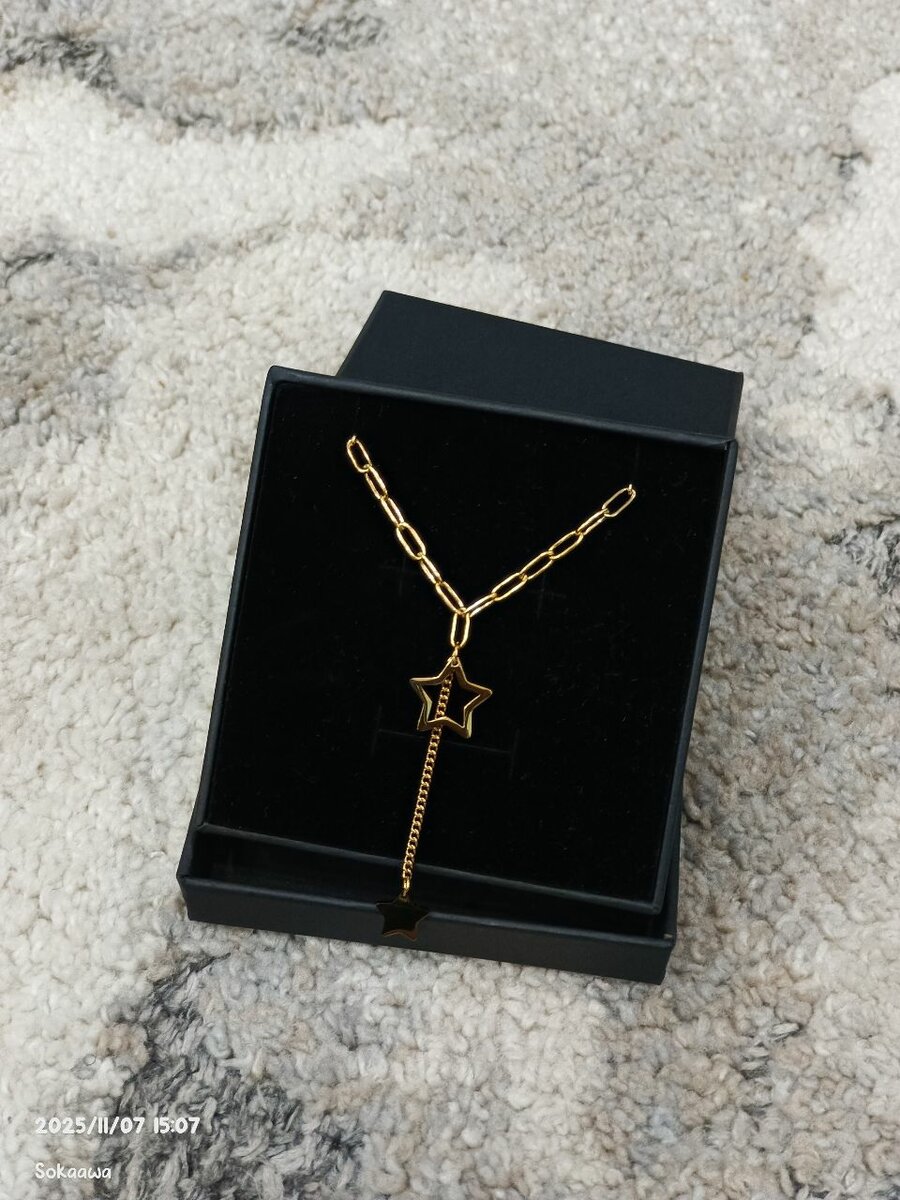 Collier pendentif étoiles dorées