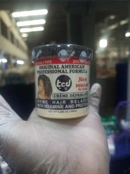 Crème défrisante cheveux TCD