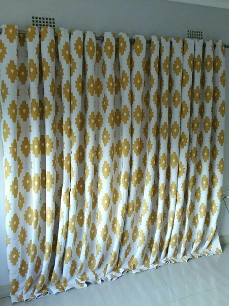 2 drops of curtains white with yellow patterns