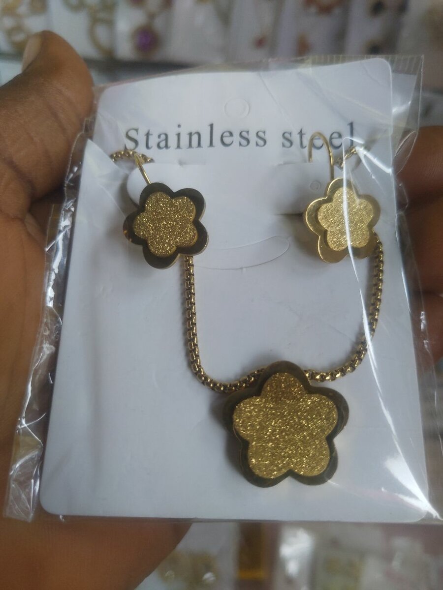 Collier et Boucles Fleur Inox