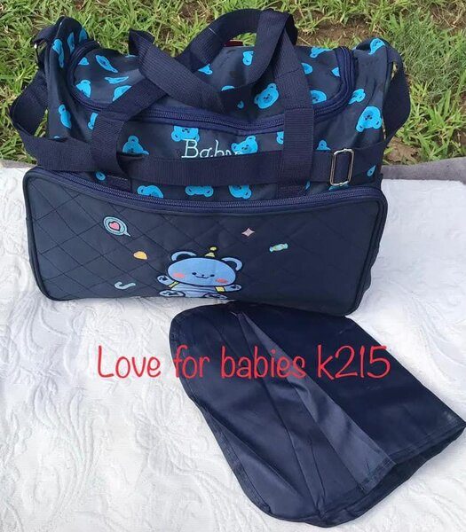 Travel bag for children's clothes and accessories, dark blue with print