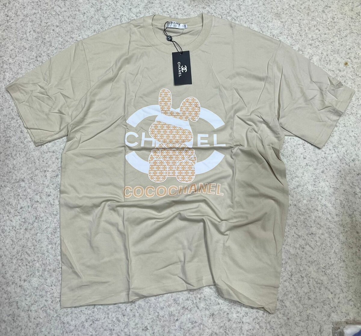 T-shirt beige imprimée